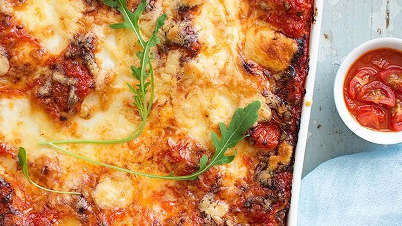 A rich, multi-layered baked beef lasagne with melted mozzarella and marinara sauce.
