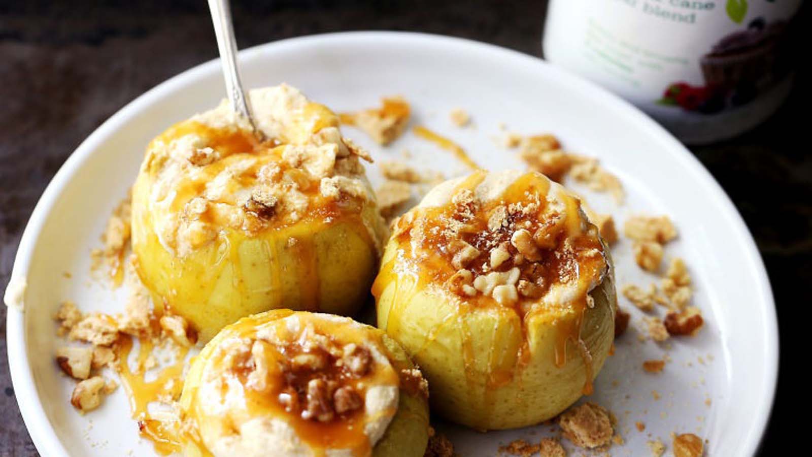 A sweet whole baked apple stuffed with toasted sliced almonds and spices.