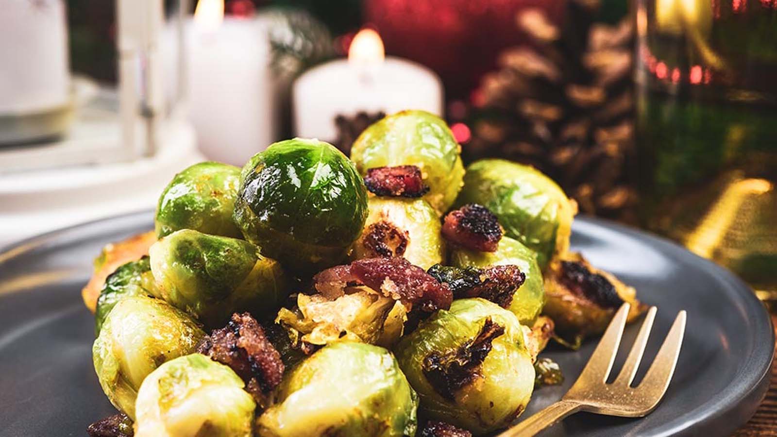 Sautéed green Brussels sprouts tossed beautifully with crispy pan-fried bacon bits.