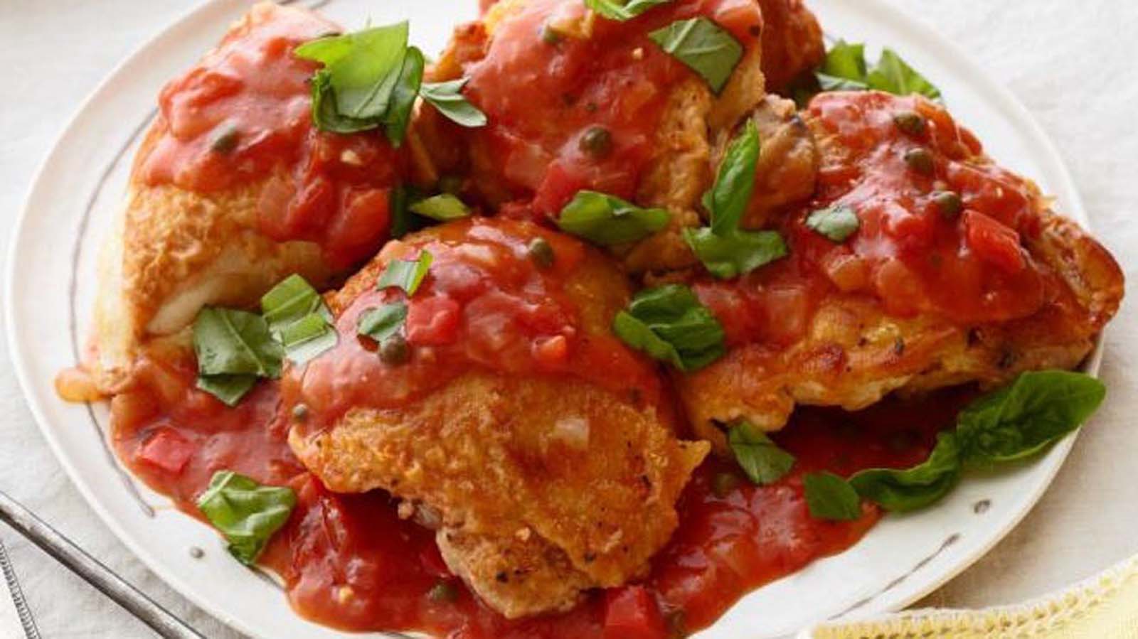 Classic Italian chicken cacciatore braised with tomatoes, bell peppers, garlic, and herbs.