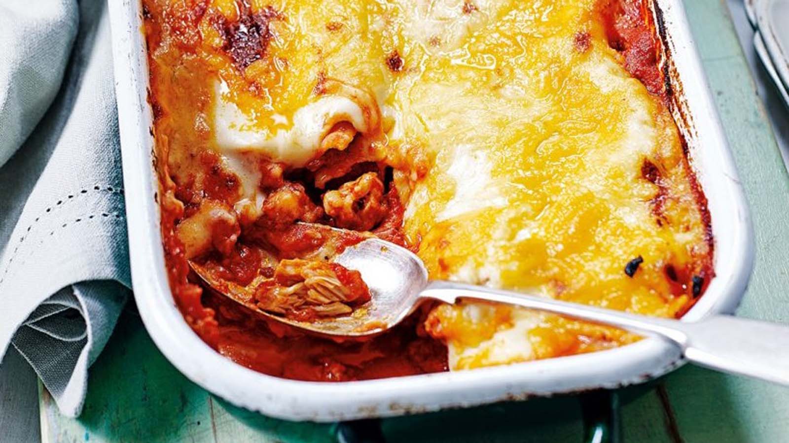 A hearty layered chicken lasagne baked to a golden cheesy perfection.