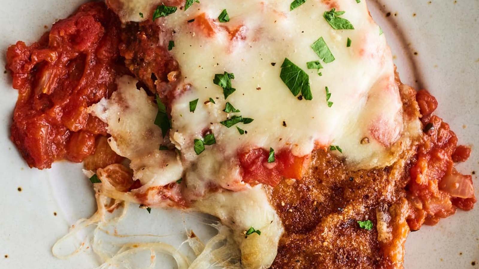 Crispy breaded chicken parmesan cutlets baked with melted mozzarella and marinara sauce.