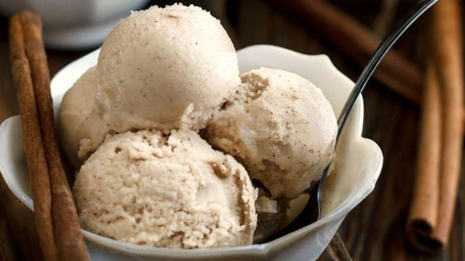 A scoop of unique, warm-spiced sweet cinnamon ice cream frozen dessert.
