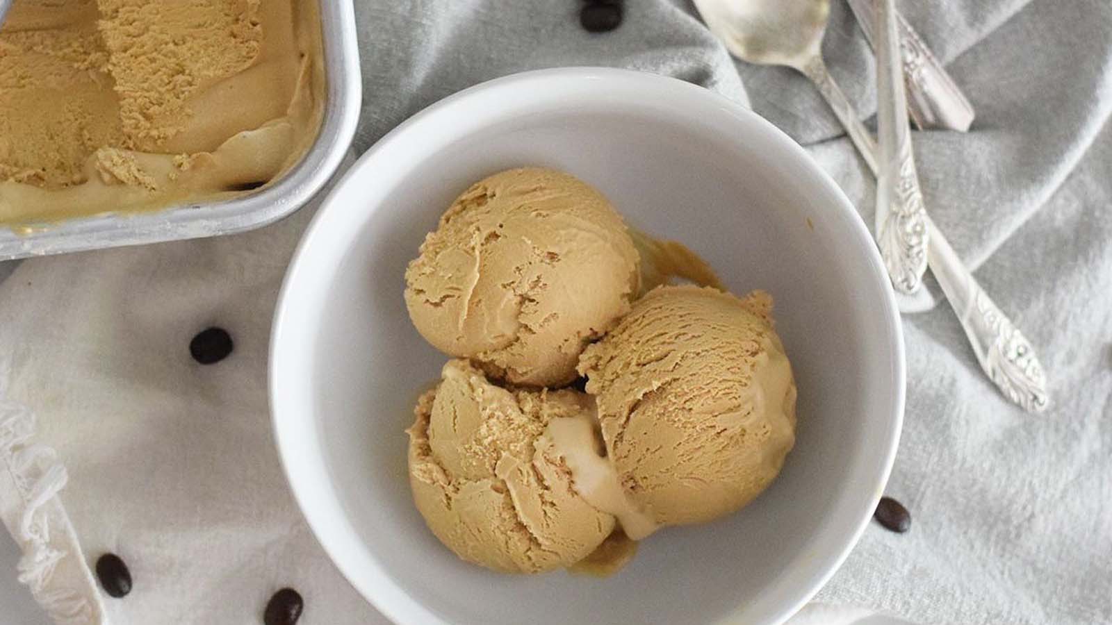 A rich and bold scoop of dark coffee ice cream frozen dessert treats.