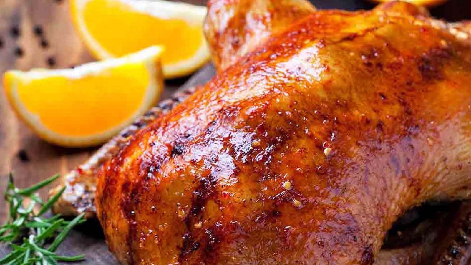 An elegant dish of French duck a l''orange roasted duck breast with sweet orange glaze.