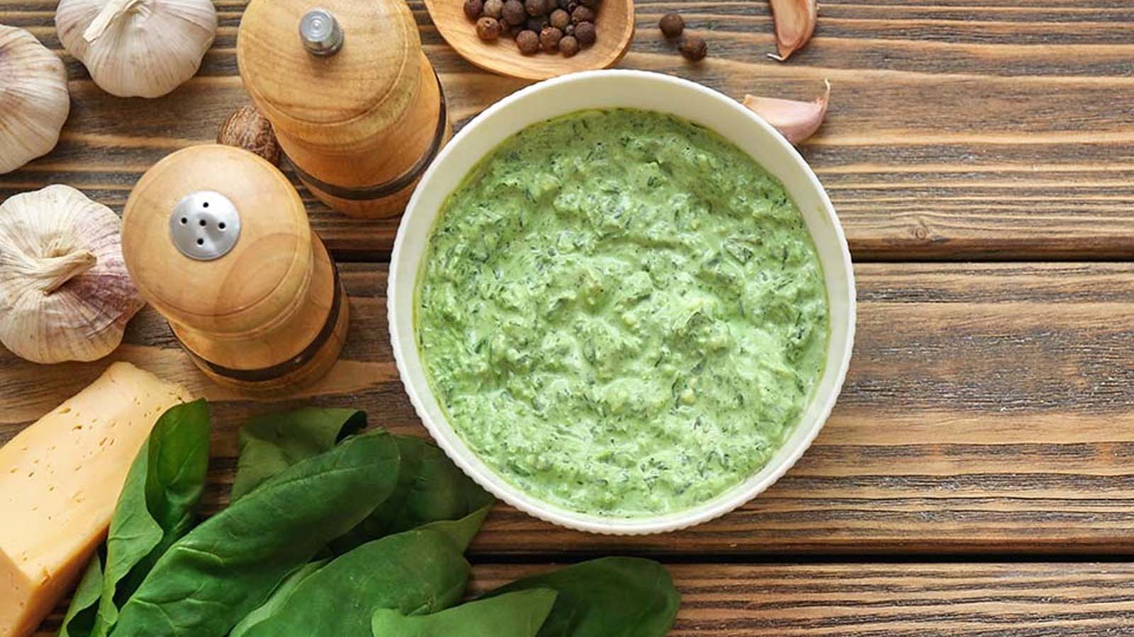 A side dish of extra rich and smooth creamy creamed spinach cooked with garlic cream.