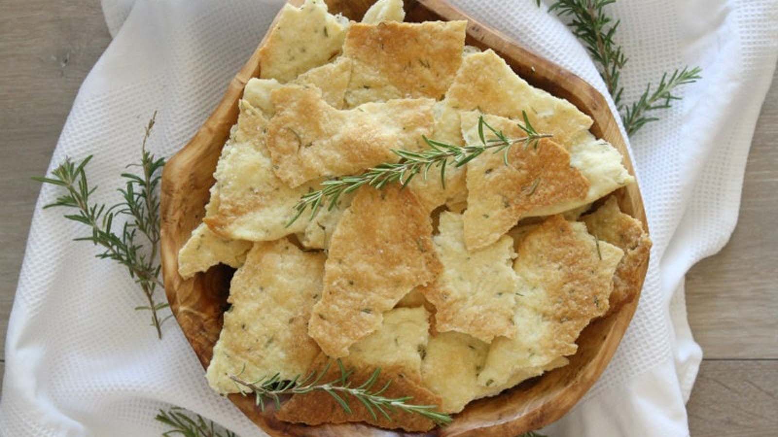 Freshly baked crisp flatbread seasoned generously with aromatic rosemary and olive oil.