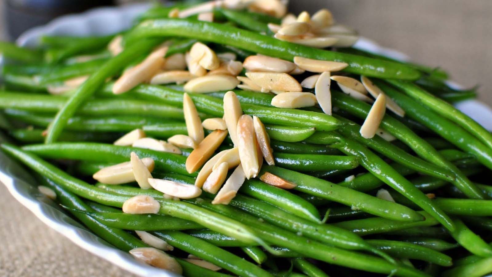 Fresh green beans blanched and tossed with toasted crunchy silvered almonds bits.