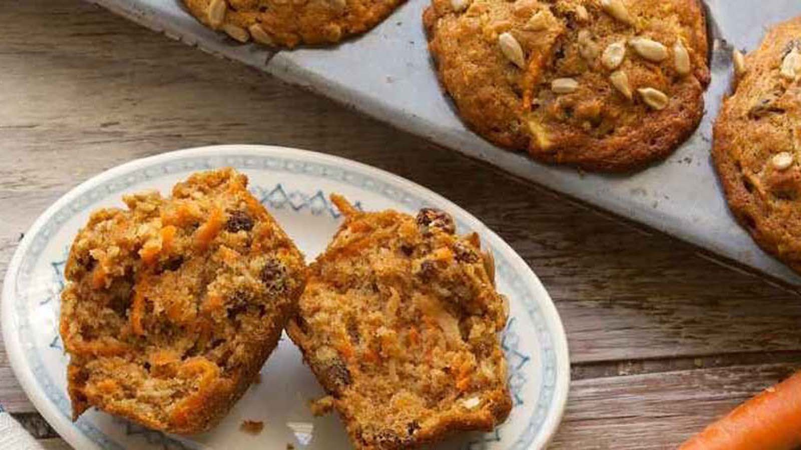 A basket of wholesome, rustic health muffins filled with whole grains and seeds.