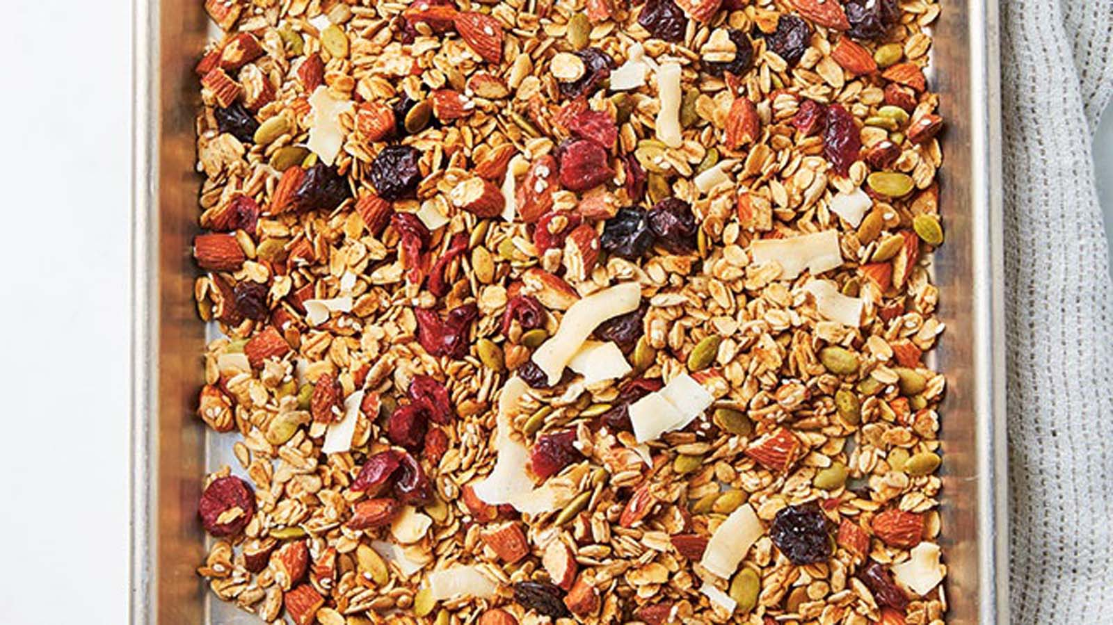 A healthy breakfast bowl of toasted nut and seed muesli cereal mix.