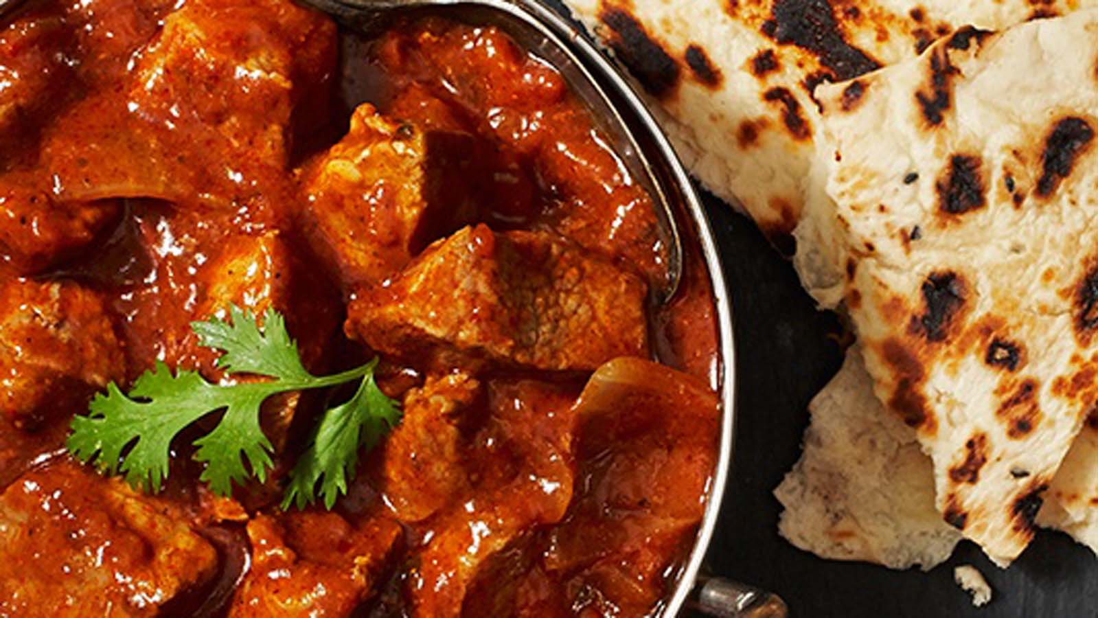 A tender, dark and richly spiced Indian lamb rogan josh curry stew dish.