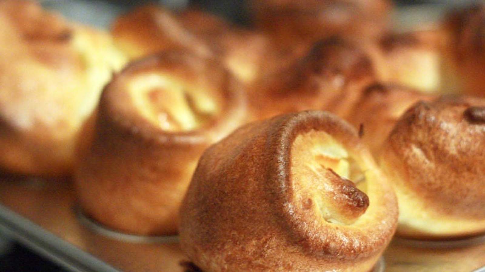 Puffy, hollow mini Yorkshire puddings baked to a perfect golden brown crisp.