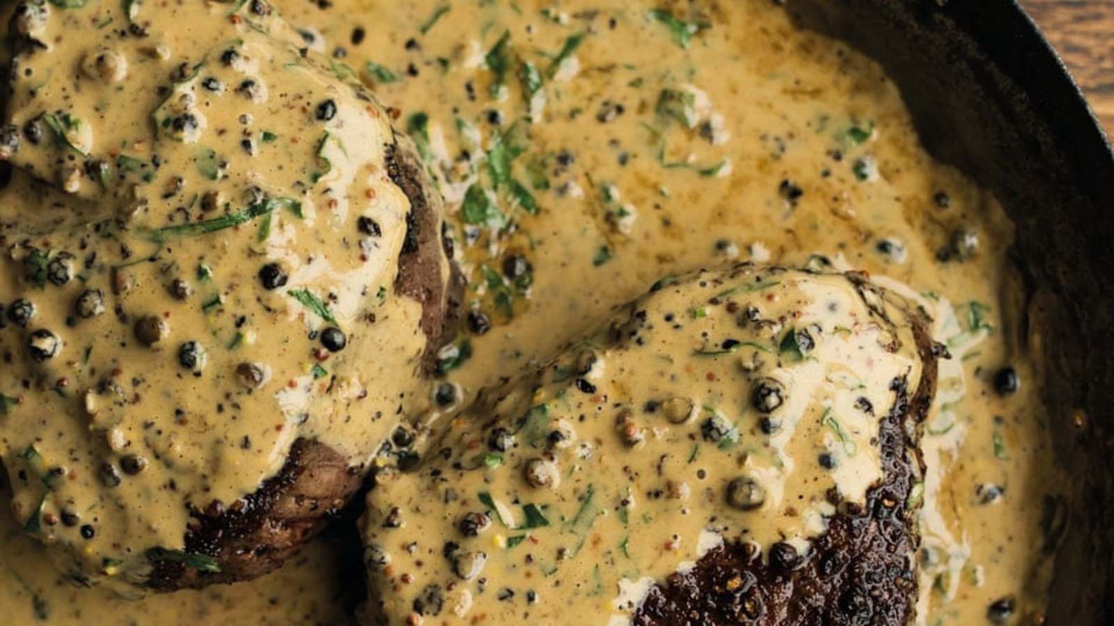 A pungent and bold creamy mustard and pepper steak sauce served warm.