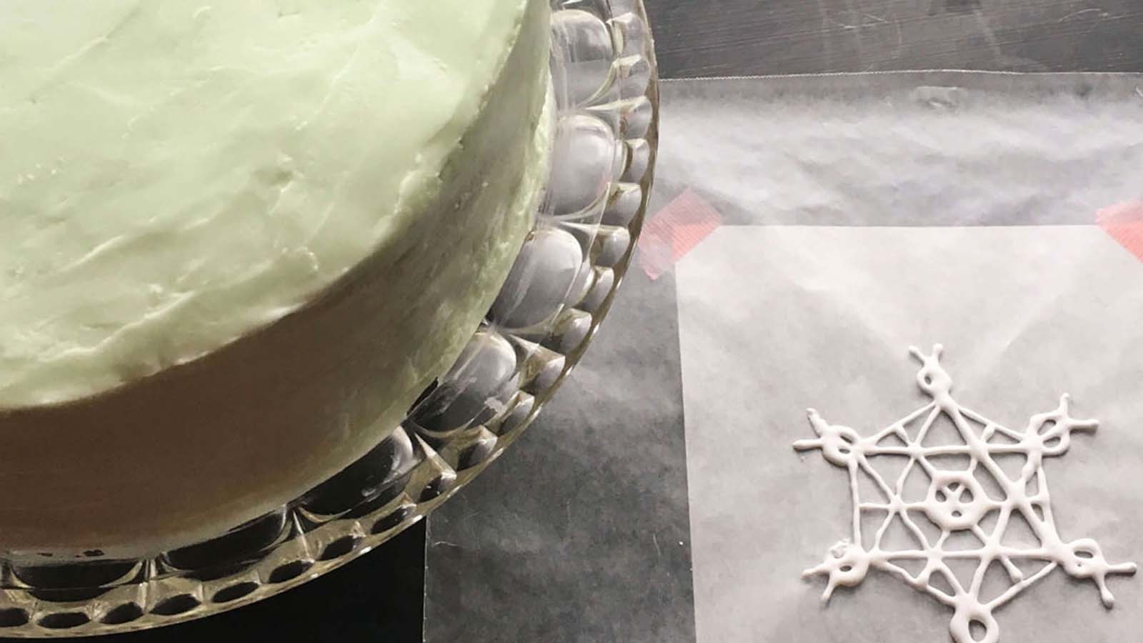 Intricately patterned decorative pate a decor pastry wrap for cake lining.