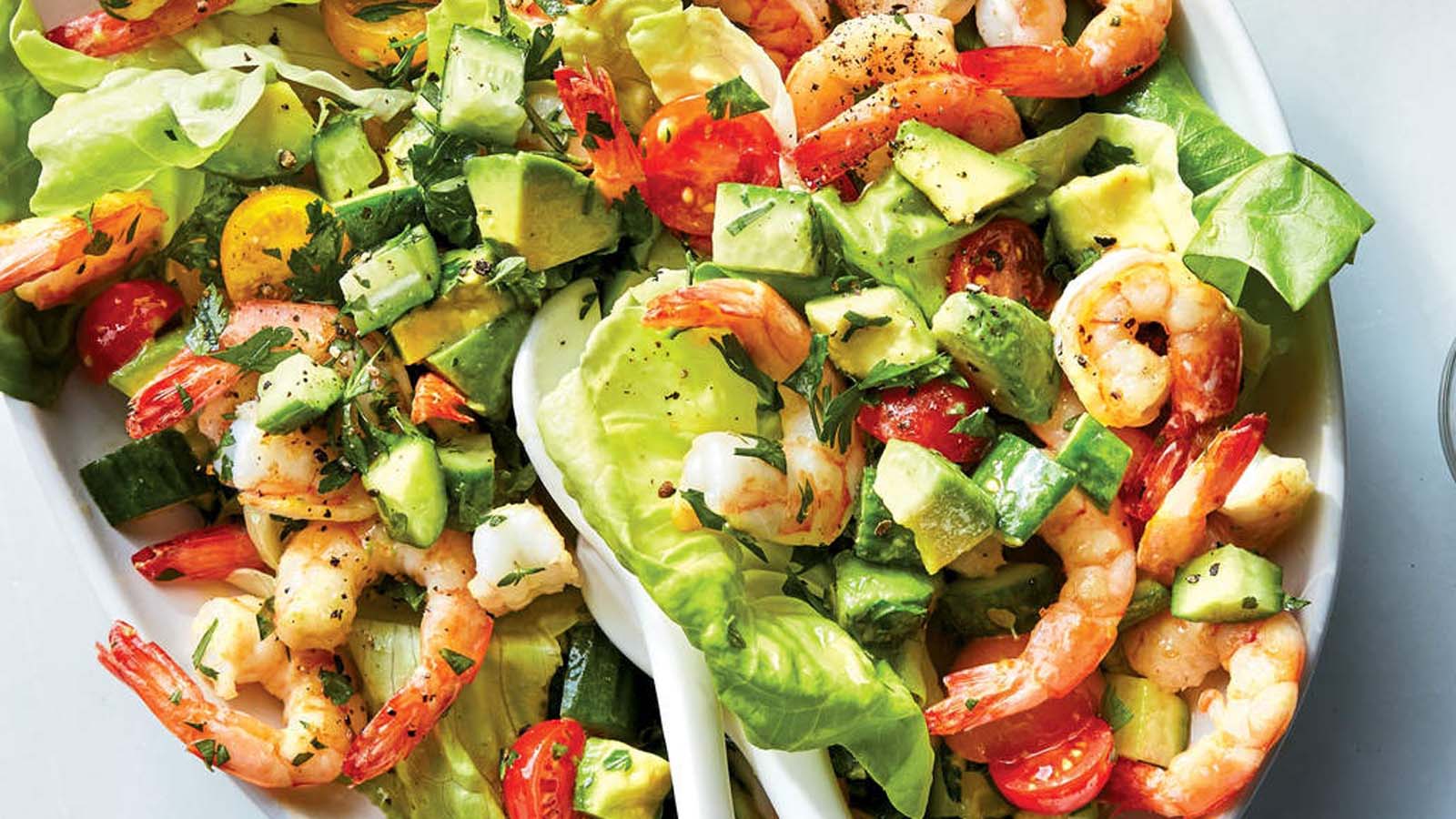 A clean and light prawn salad with succulent poached prawns and avocado slices.