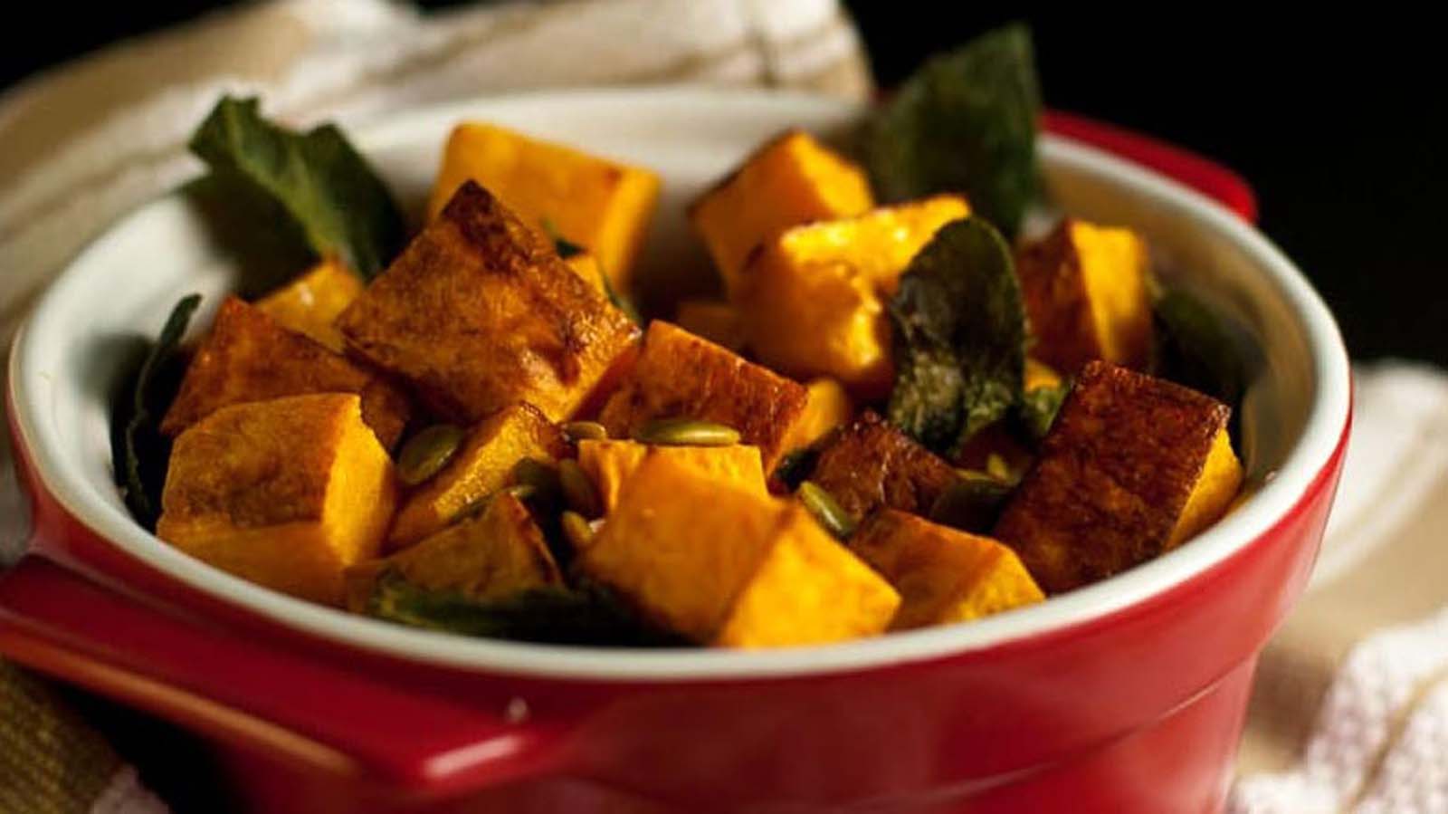 Cubes of tender roasted butternut squash baked with fragrant fresh sage leaves.