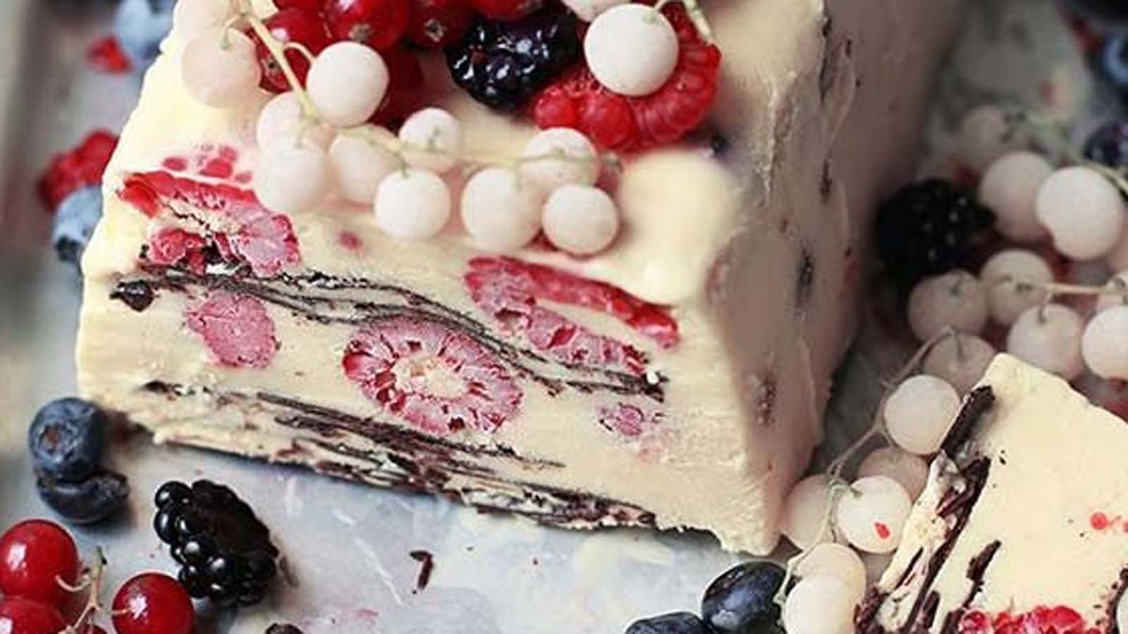 A smooth semi-freddo frozen chocolate dessert sliced cleanly to show its rich texture.