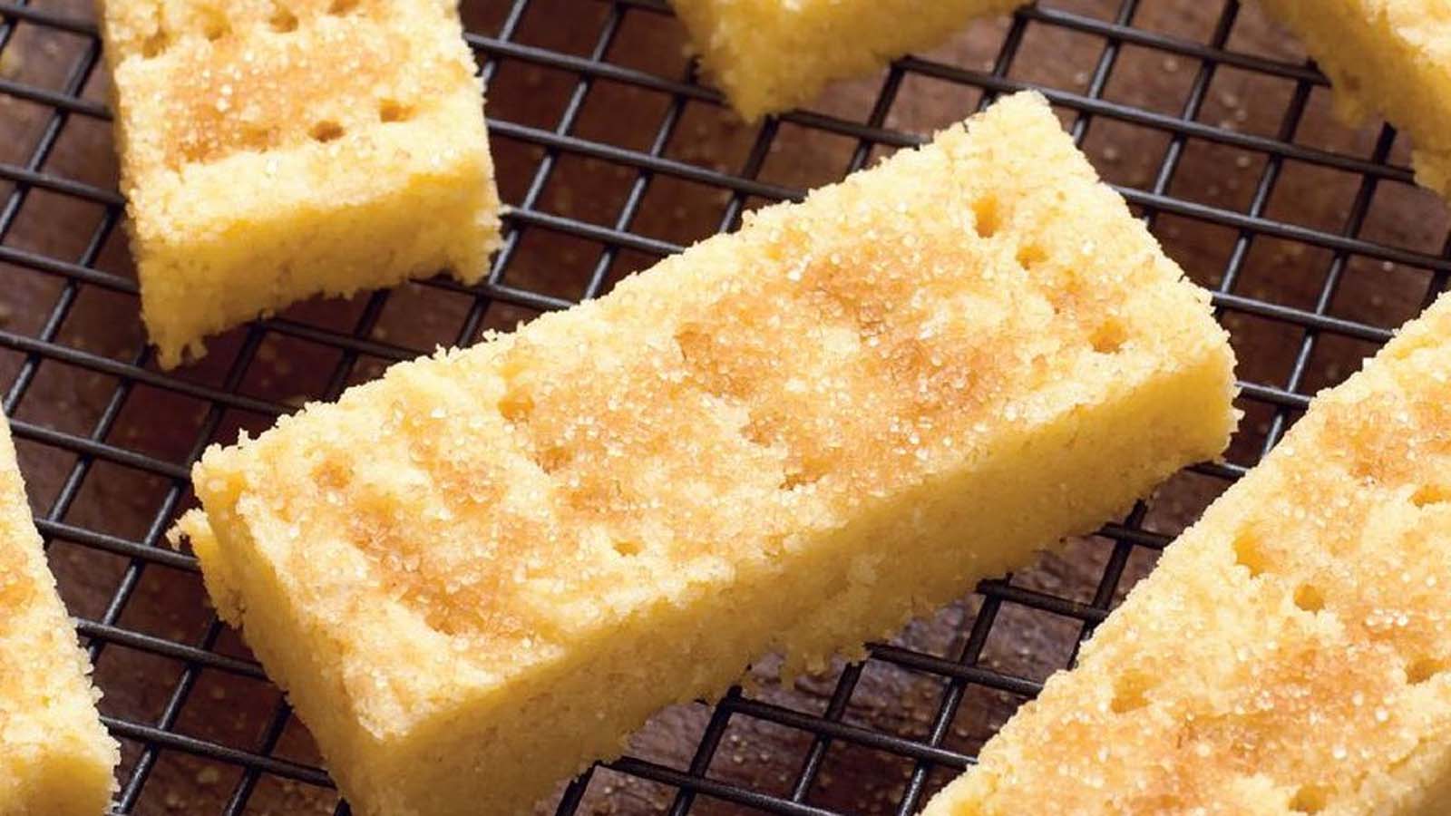 Buttery, crumbly shortbread squares baked to a delicate golden colour and sliced into bars.