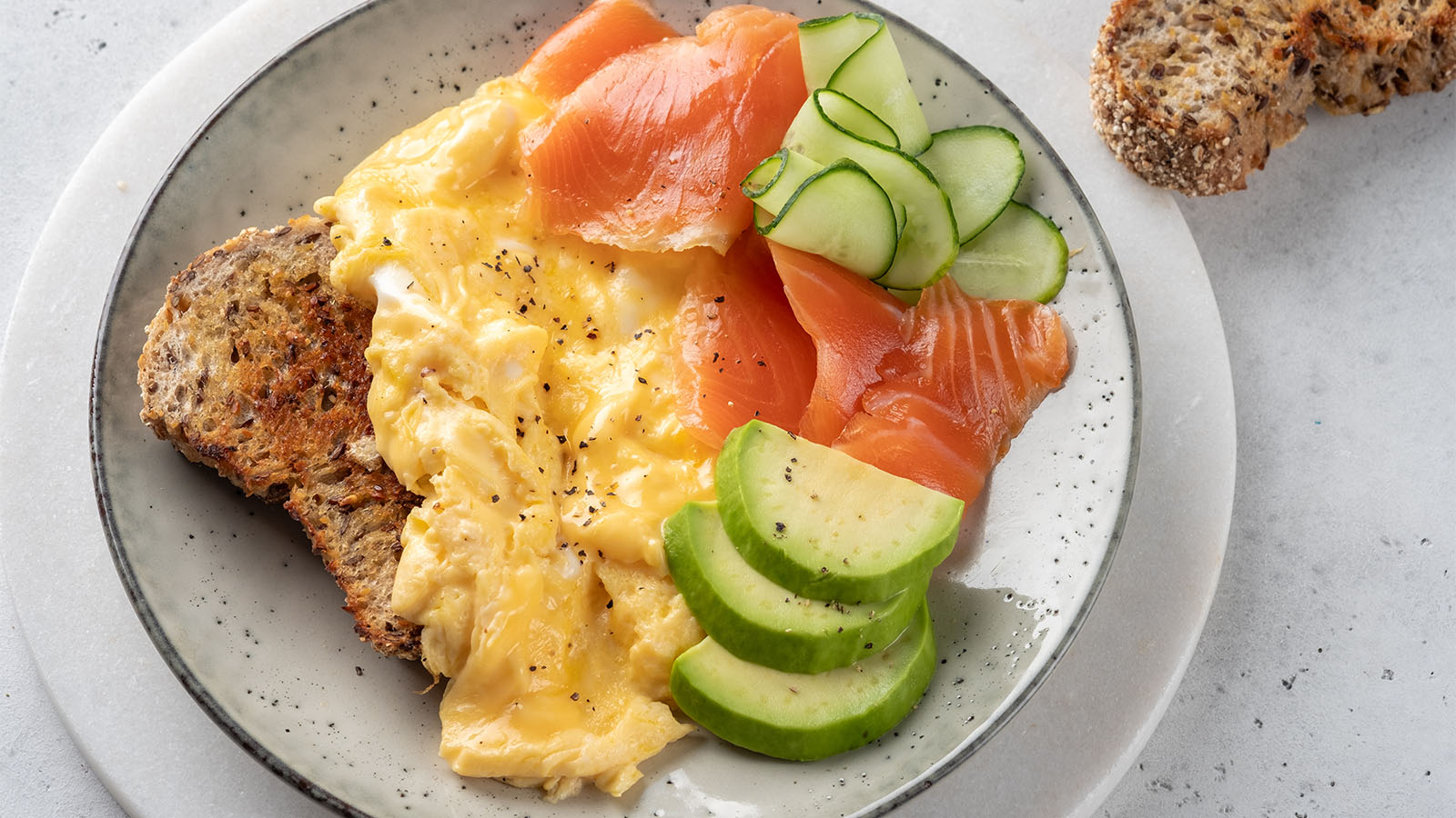 A premium breakfast omelet stuffed with luxury smoked salmon ribbons and cream cheese cream.