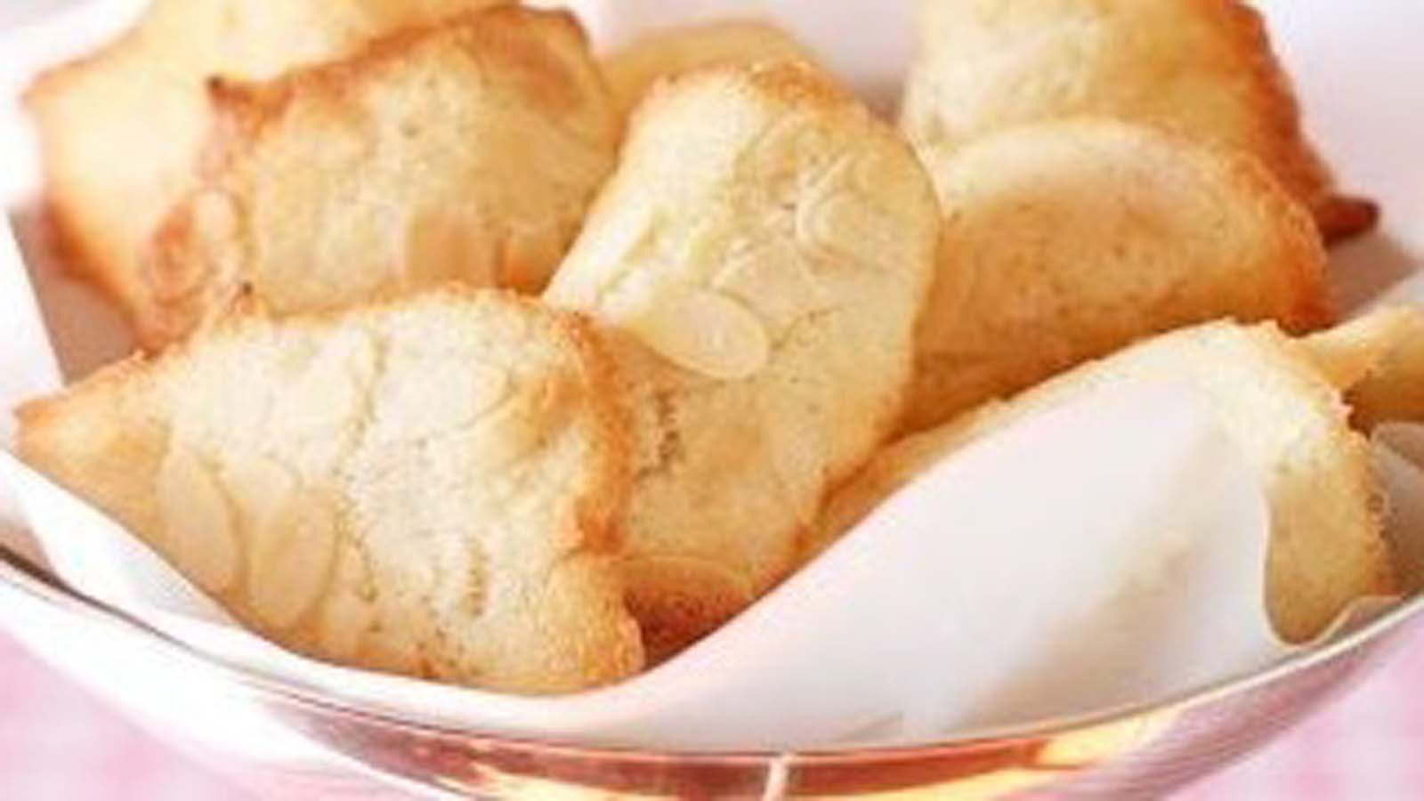 Delicate, thin French tuille biscuits shaped into crunchy decorative baskets.
