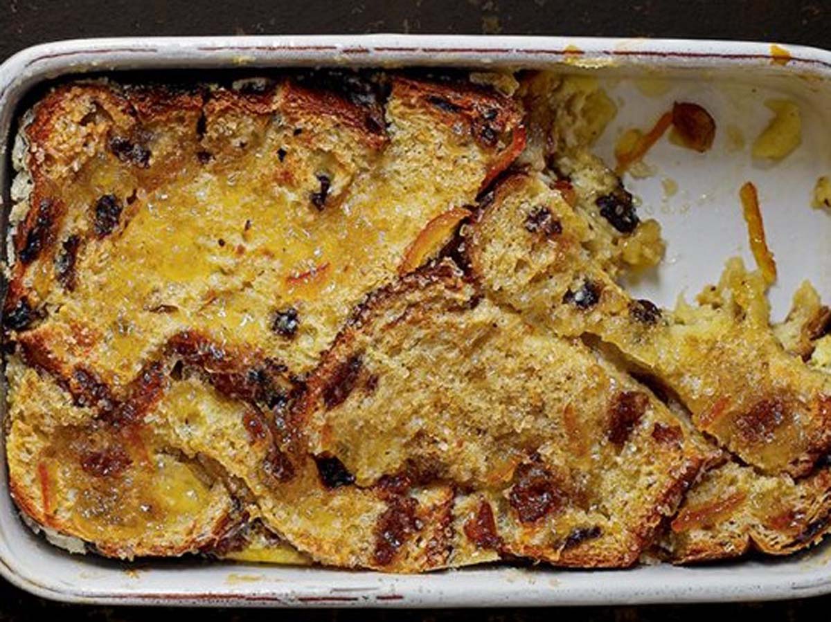 A traditional baked golden brown bread and butter pudding fresh from the oven.