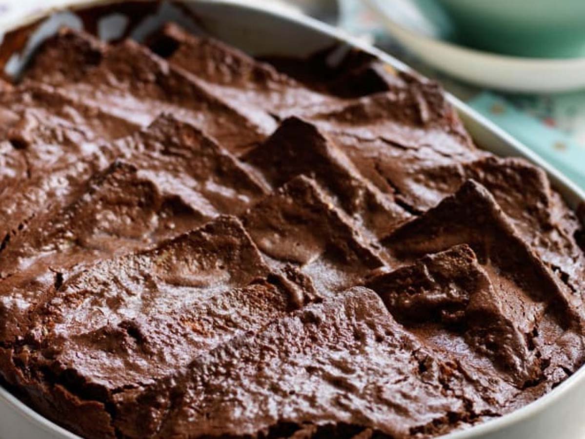 A decadent baked chocolate bread and butter pudding rich with melted cocoa.