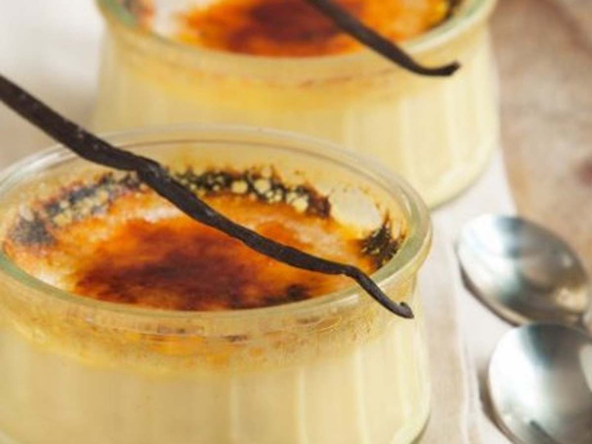 A smooth creme brulee dessert with a perfectly caramelised, brittle sugar crust on top.