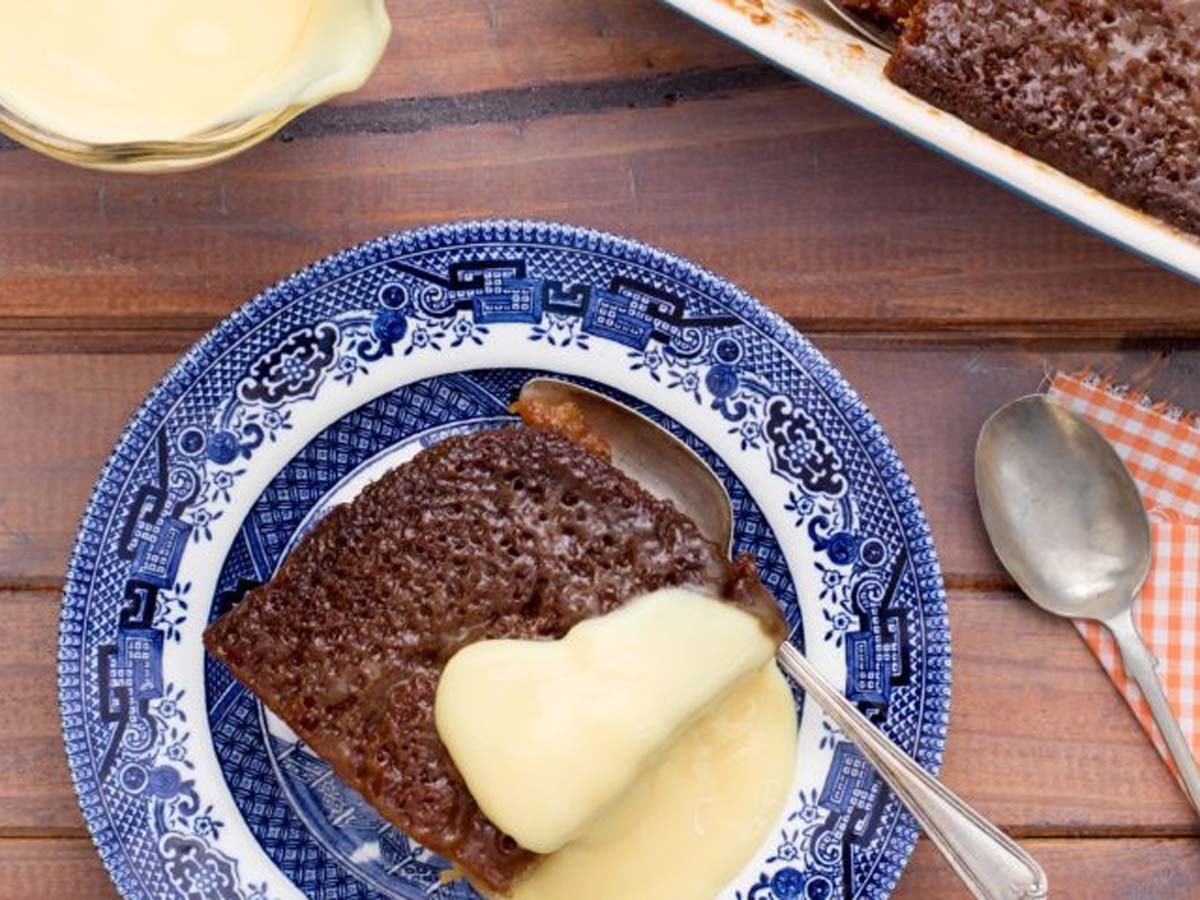 A classic South African spongy Malva pudding soaked in a rich, warm sweet butter sauce.