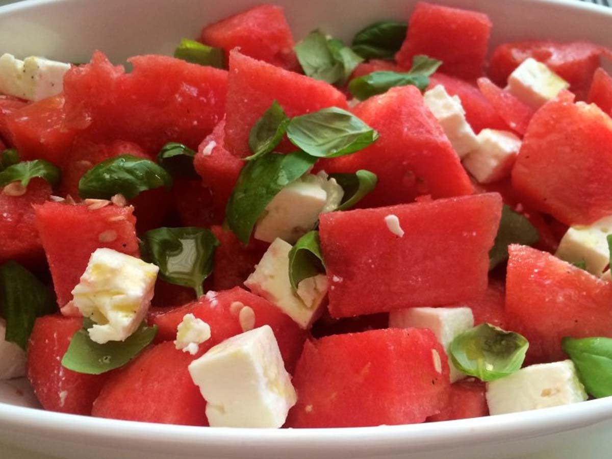 A refreshing watermelon and feta cheese salad tossed with crunchy pumpkin seeds.