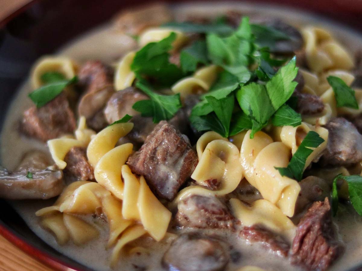 Tender strips of beef stroganoff sautéed in a rich, creamy mushroom and sour cream sauce.