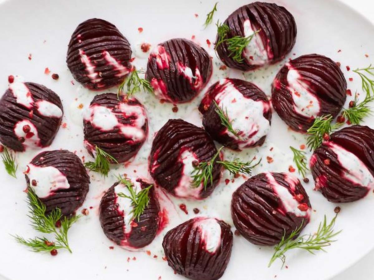 A vibrant South African beetroot side salad dressed with light vinaigrette for a braai barbecue.