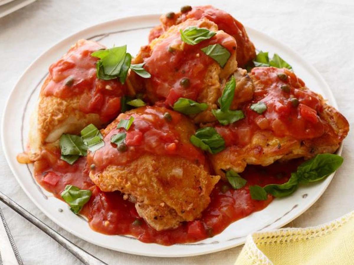 Classic Italian chicken cacciatore braised with tomatoes, bell peppers, garlic, and herbs.
