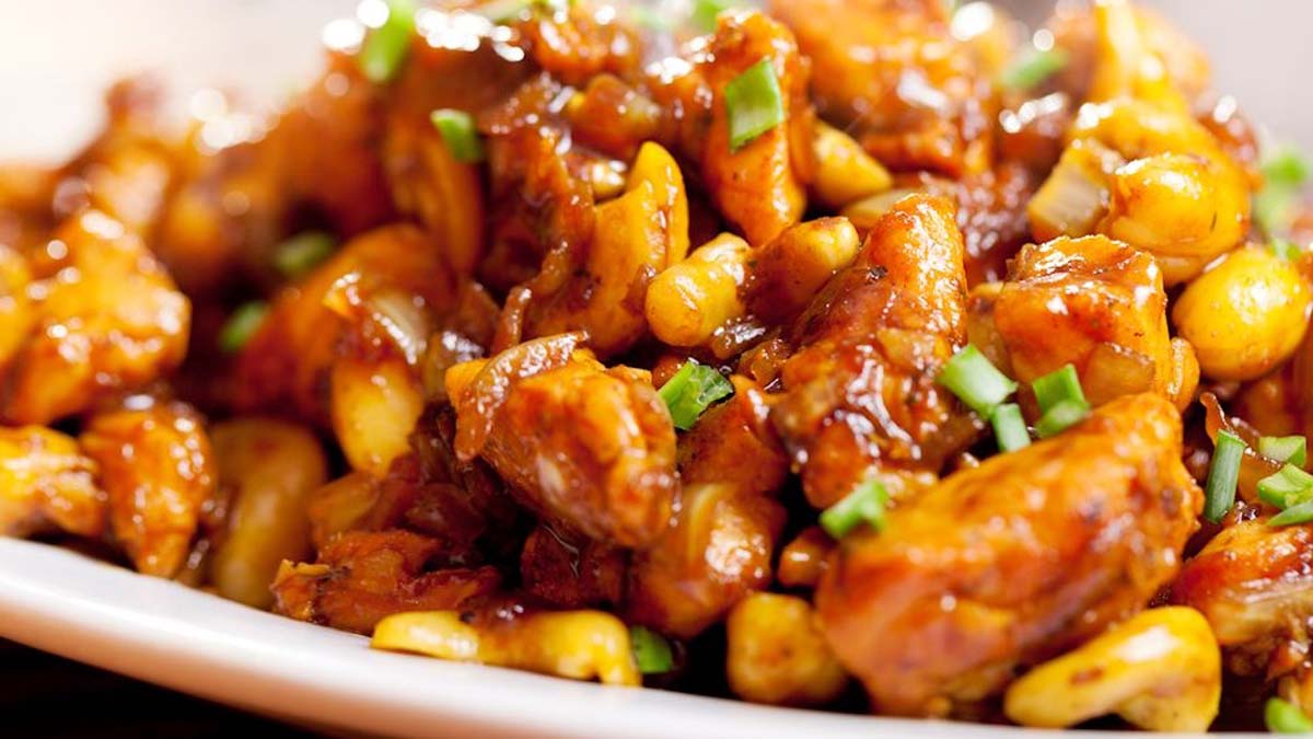 A flavorful stir-fry of chicken with crunchy cashew nuts and vegetables in a savoury sauce.