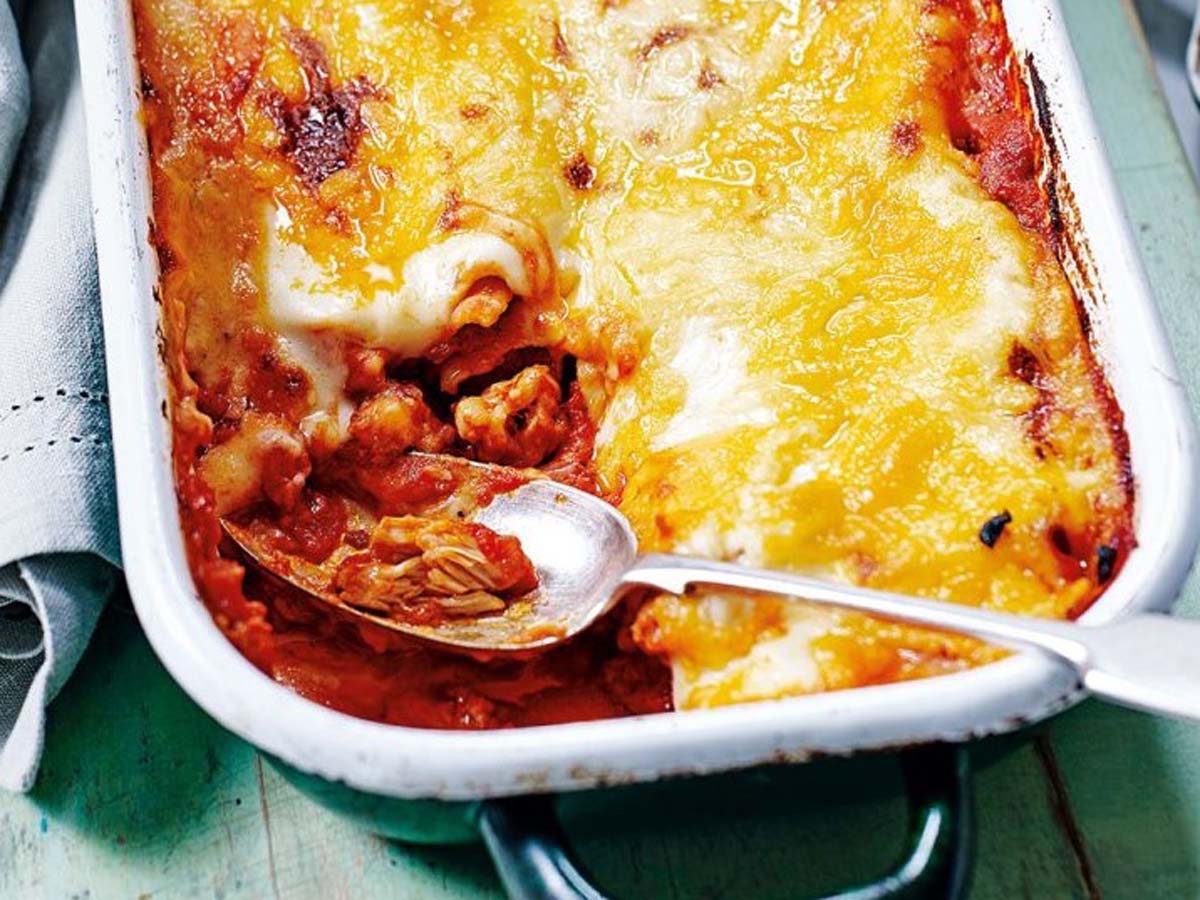 A hearty layered chicken lasagne baked to a golden cheesy perfection.