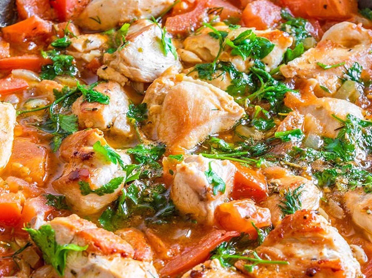 A comforting, rich chicken stew cooked with wholesome garden vegetables in a thick broth.