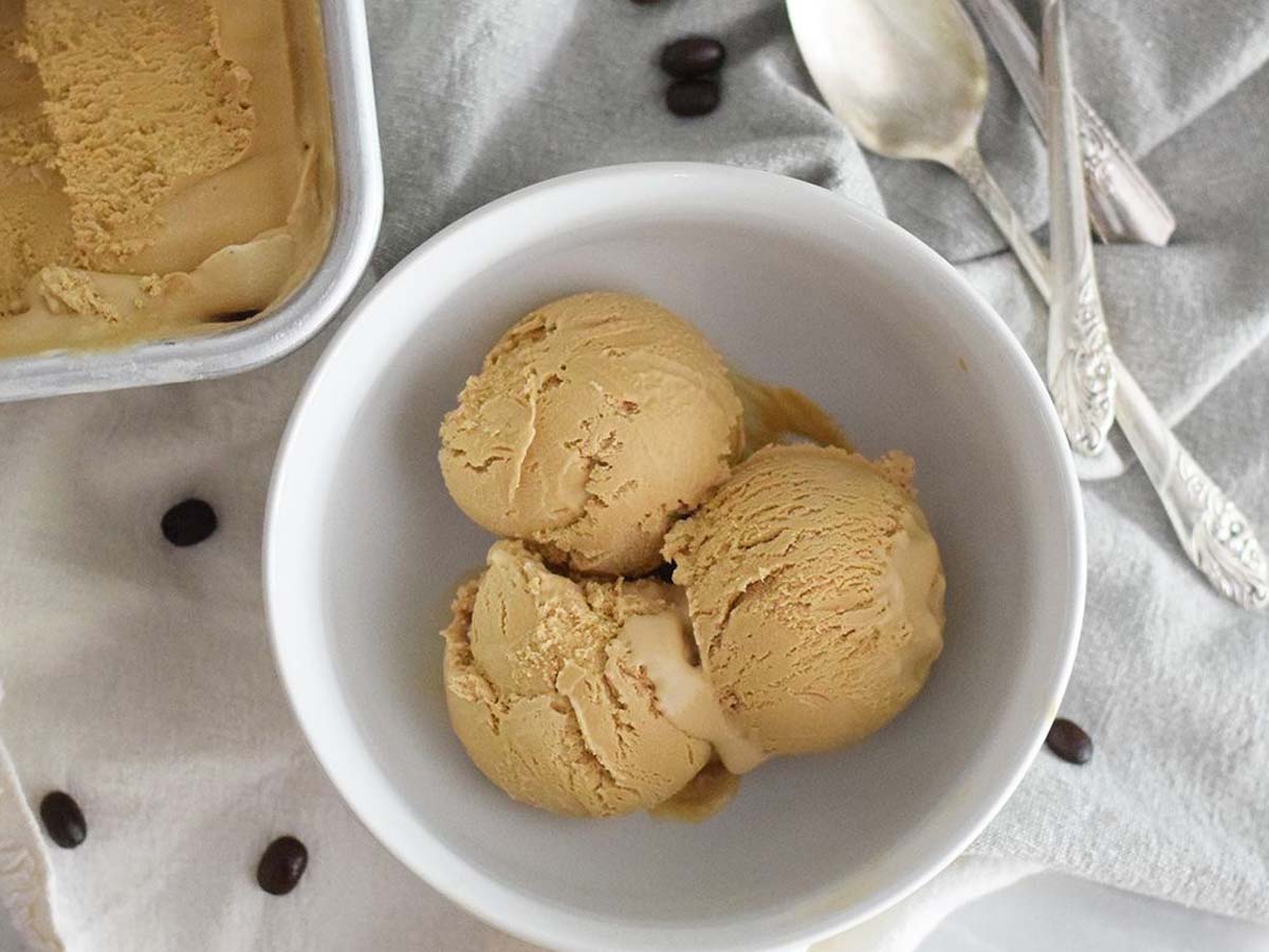 A rich and bold scoop of dark coffee ice cream frozen dessert treats.