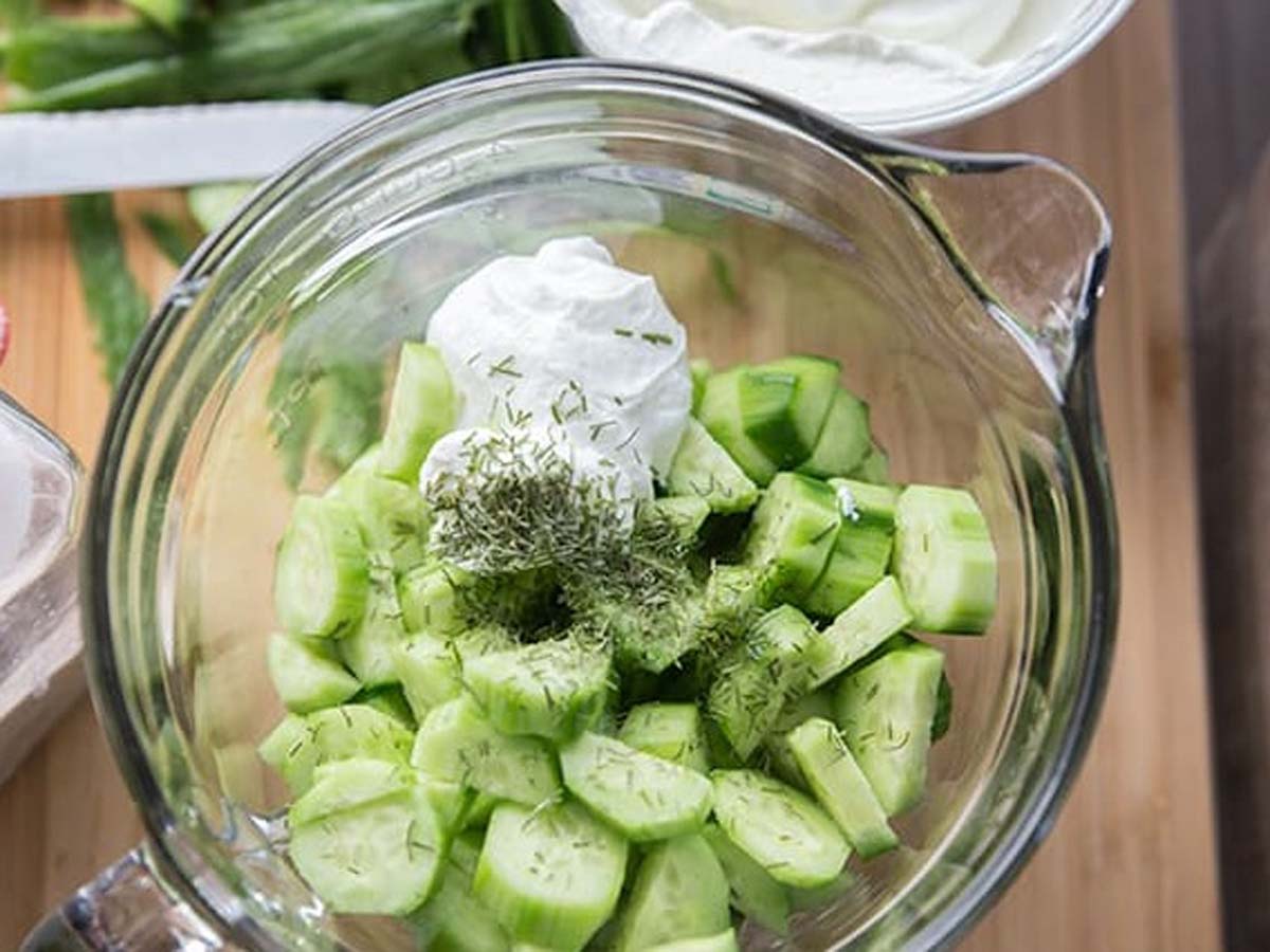 A refreshing cool cucumber salad with thin slices tossed in a light, creamy dill dressing.