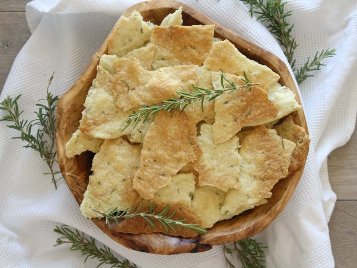Freshly baked crisp flatbread seasoned generously with aromatic rosemary and olive oil.