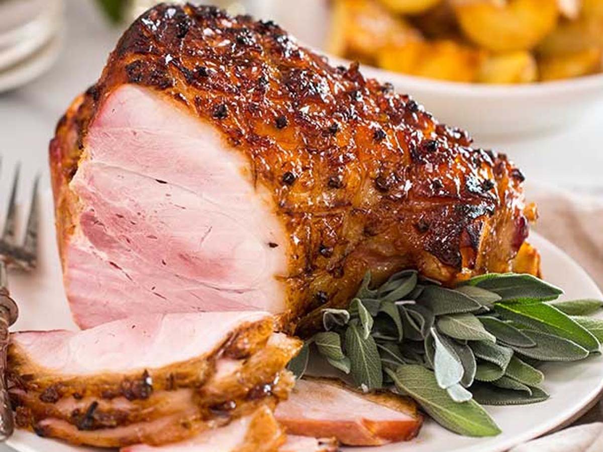 A sticky, sweet brown sugar and honey glazed ham roast perfect for a holiday feast.