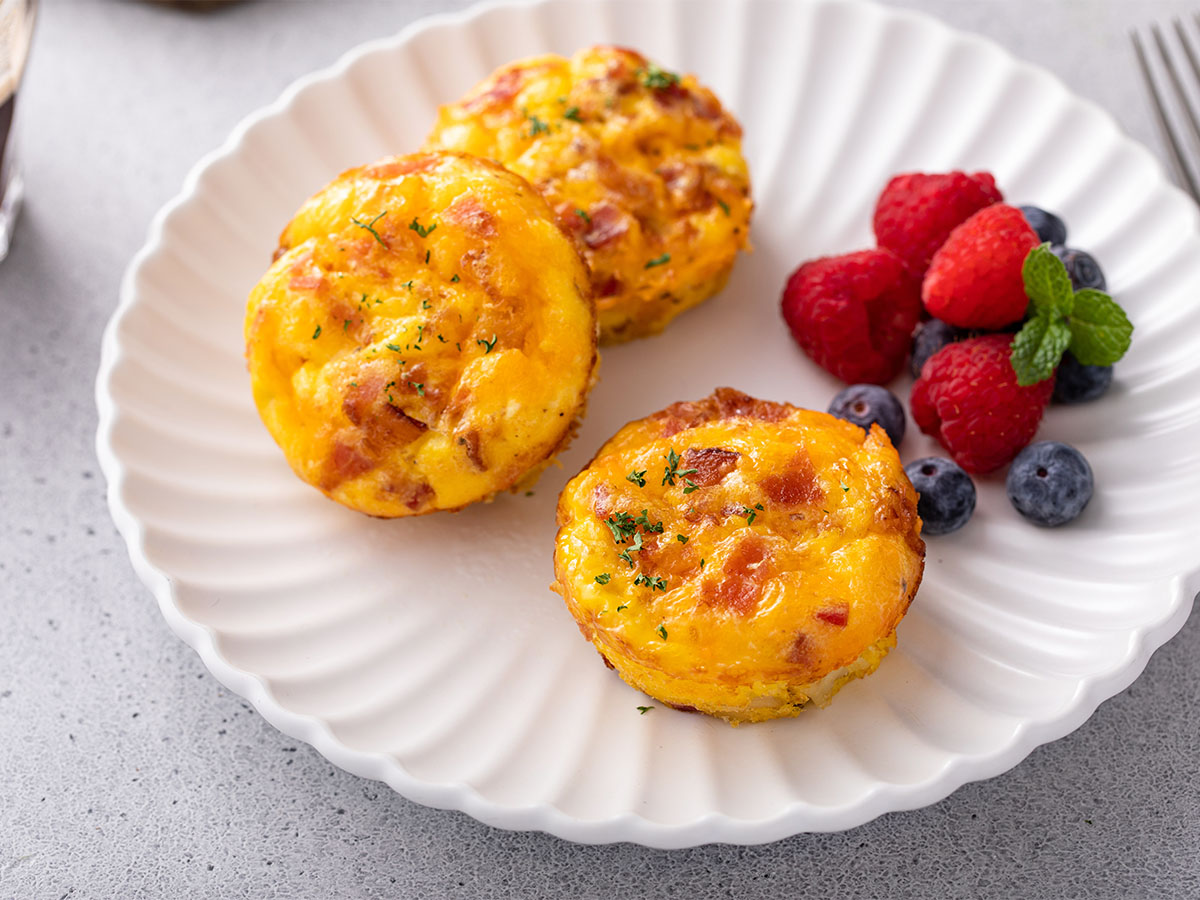 A classic simple breakfast omelette stuffed with diced ham and sharp cheddar cheese.