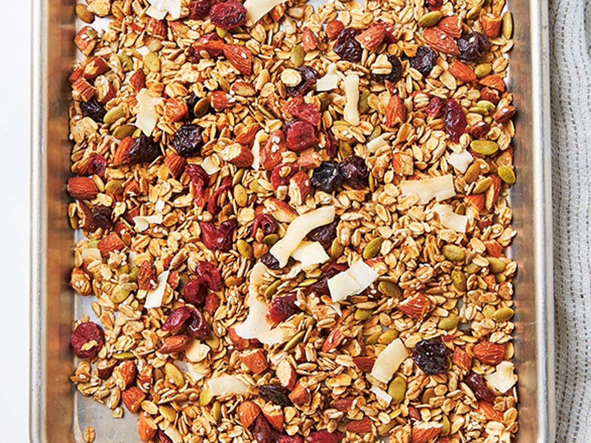 A healthy breakfast bowl of toasted nut and seed muesli cereal mix.