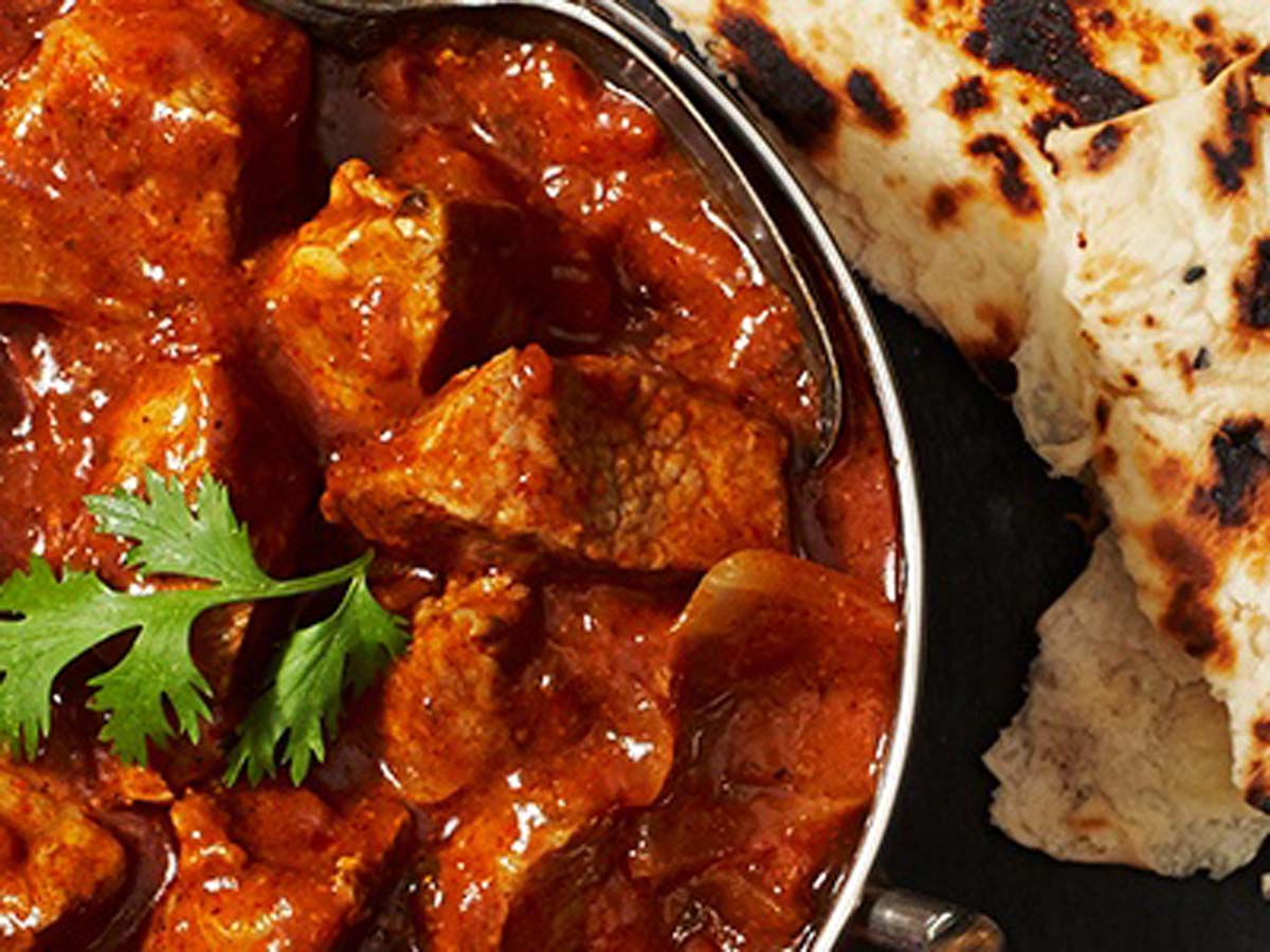 A tender, dark and richly spiced Indian lamb rogan josh curry stew dish.