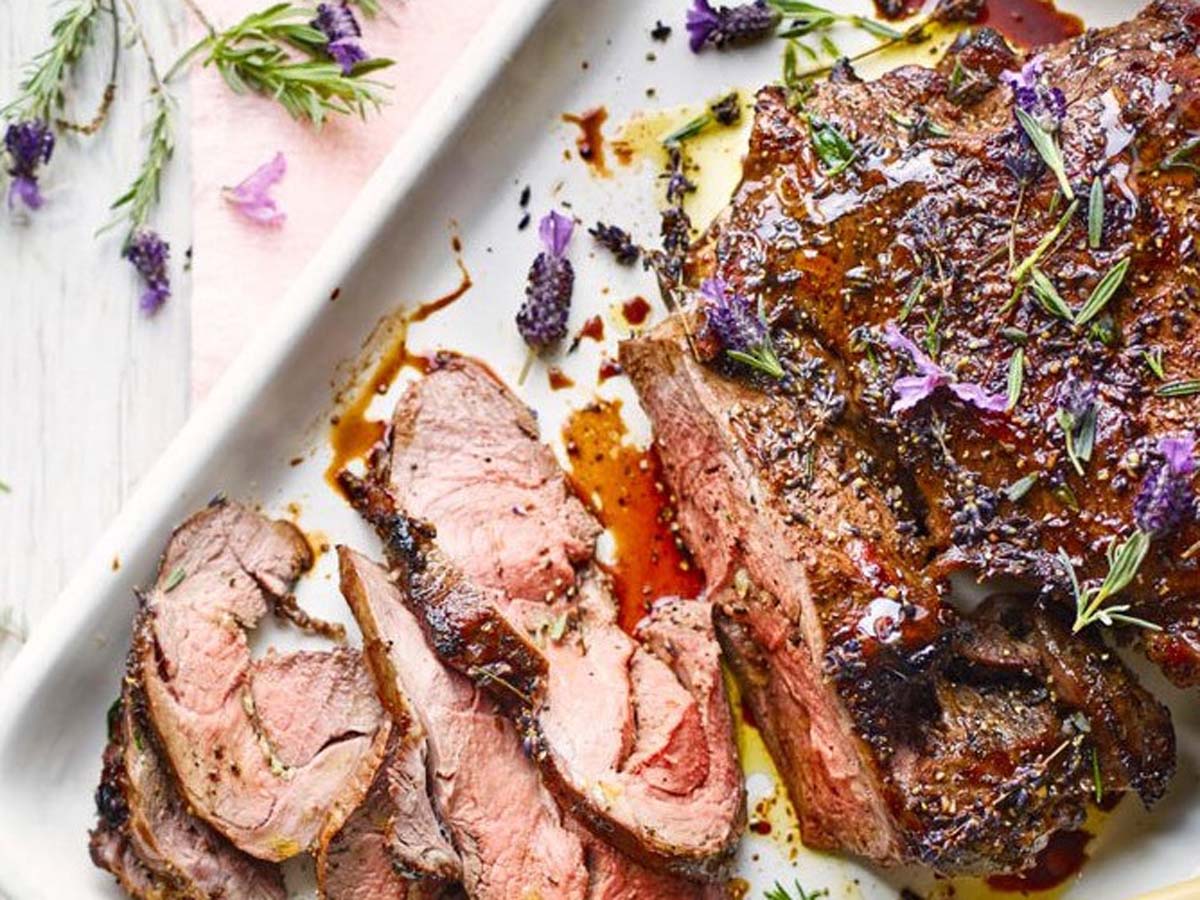 A fragrant lavender roast lamb leg cooked to tender perfection with fresh herbs.