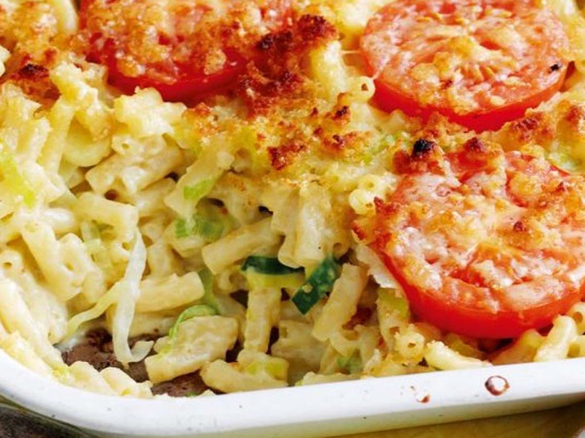 A comforting dish of baked macaroni cheese with a bubbling, golden brown crust.