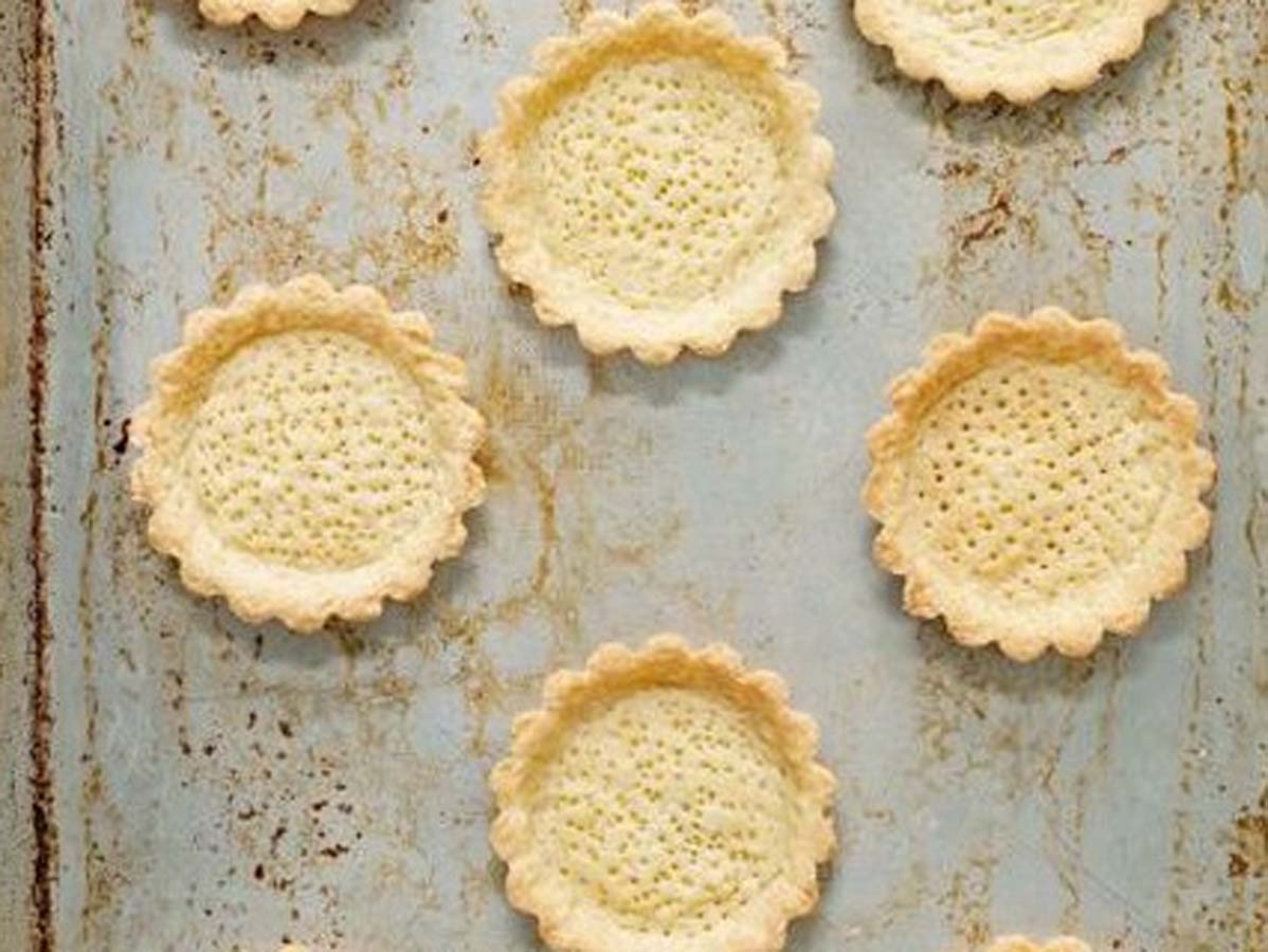 A perfectly baked, crisp and sweet pate sucre pastry tart shell base.