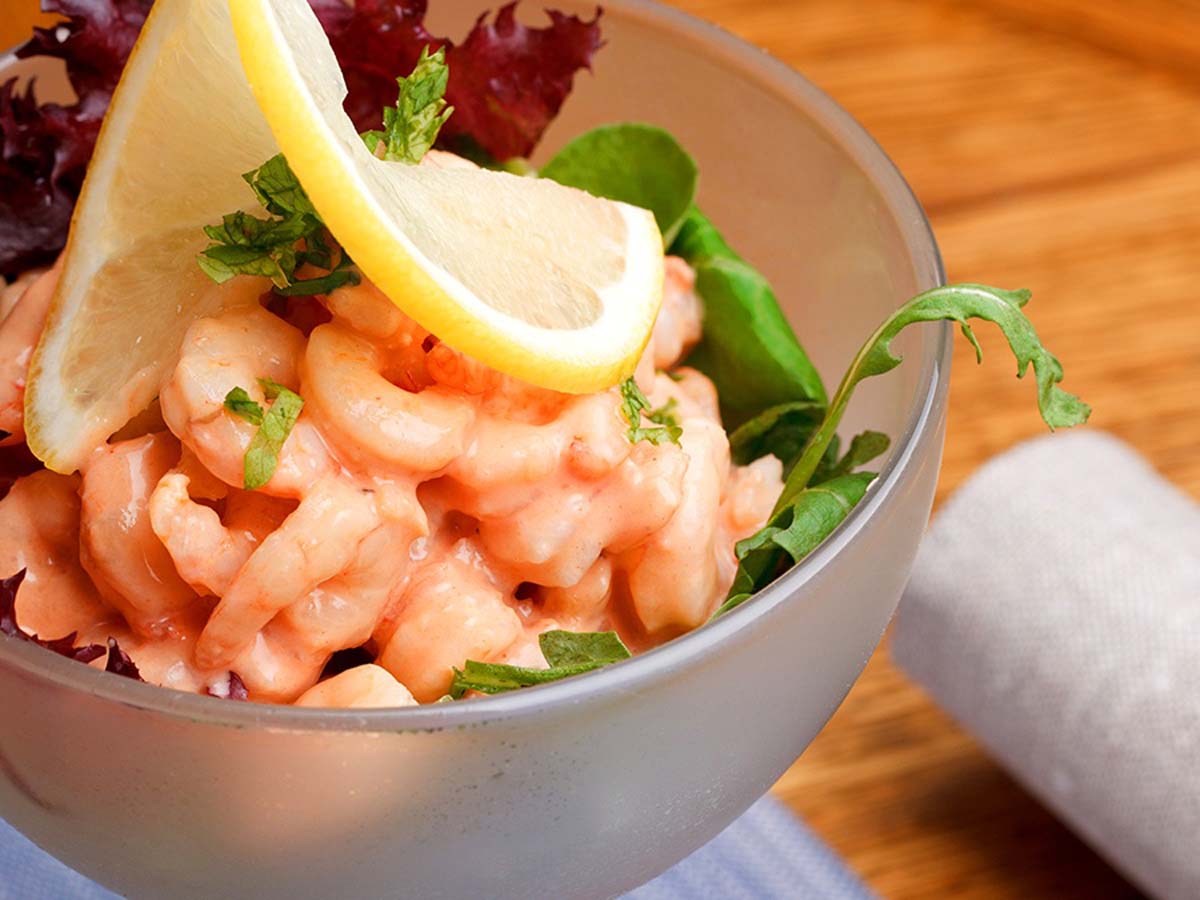 A classic tangy pink prawn cocktail sauce ready for seafood dipping.