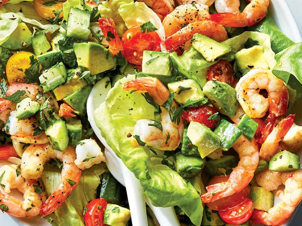 A clean and light prawn salad with succulent poached prawns and avocado slices.