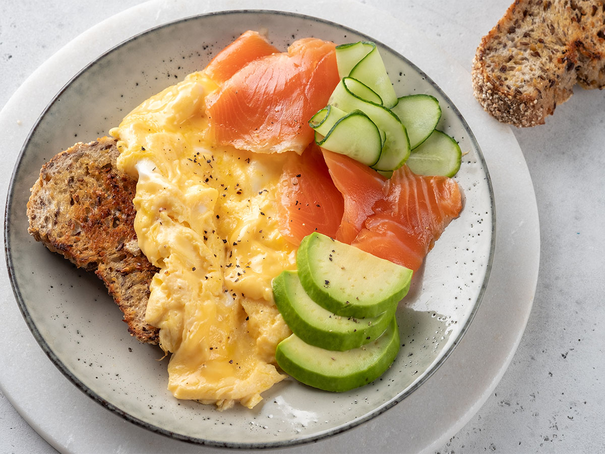 A premium breakfast omelet stuffed with luxury smoked salmon ribbons and cream cheese cream.