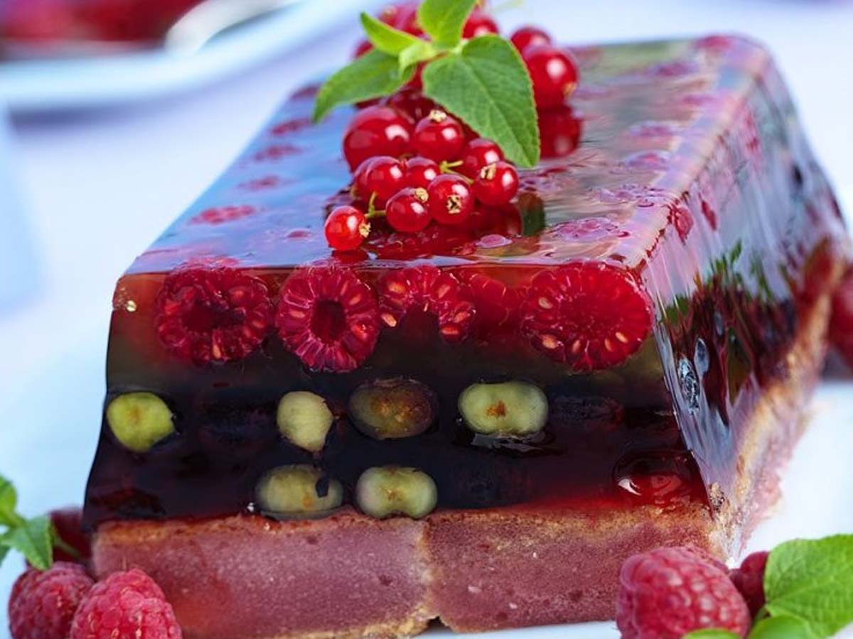 A beautiful translucent summer fruit terrine gel dessert packed with colorful berries.