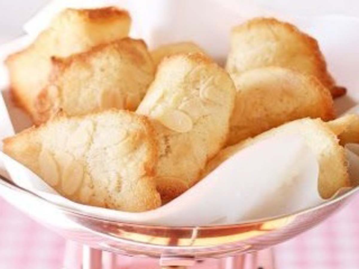 Delicate, thin French tuille biscuits shaped into crunchy decorative baskets.